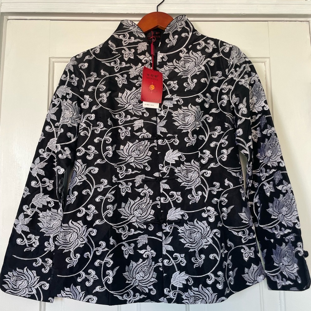 Intricate silk Chinese floral brocade. Fully lined